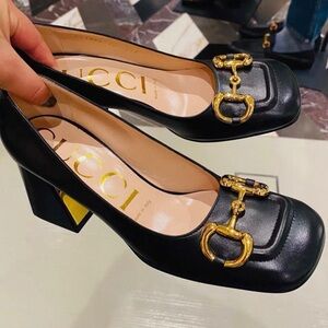 Gucci Black Heels with Gold Accents